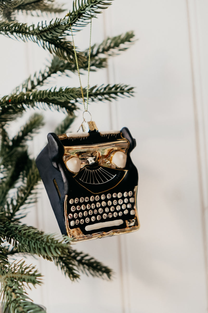 Tortured Typewriter Black and Gold Glitter Glass Christmas Tree Bauble